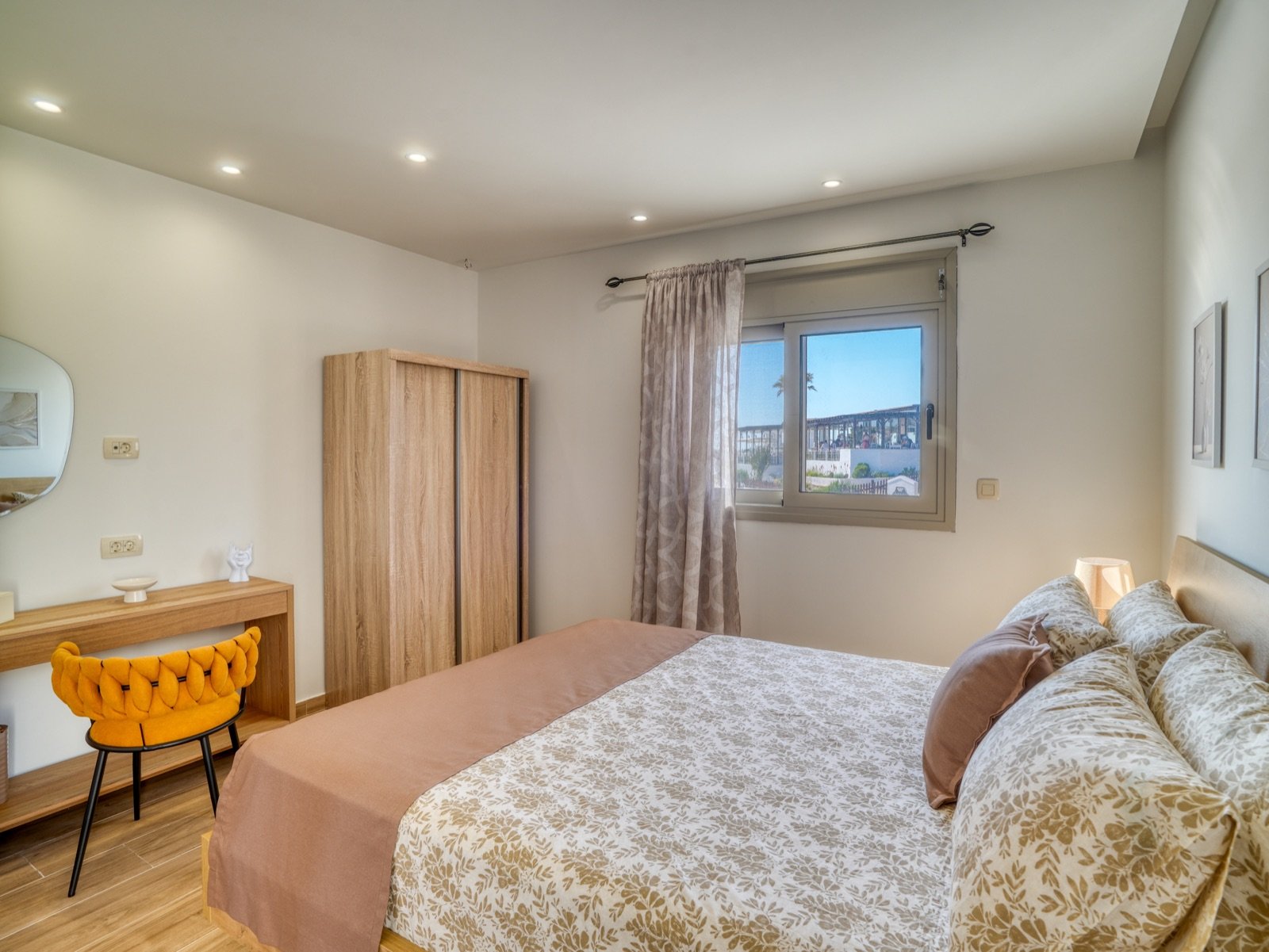 Second bedroom with double bed and dressing table