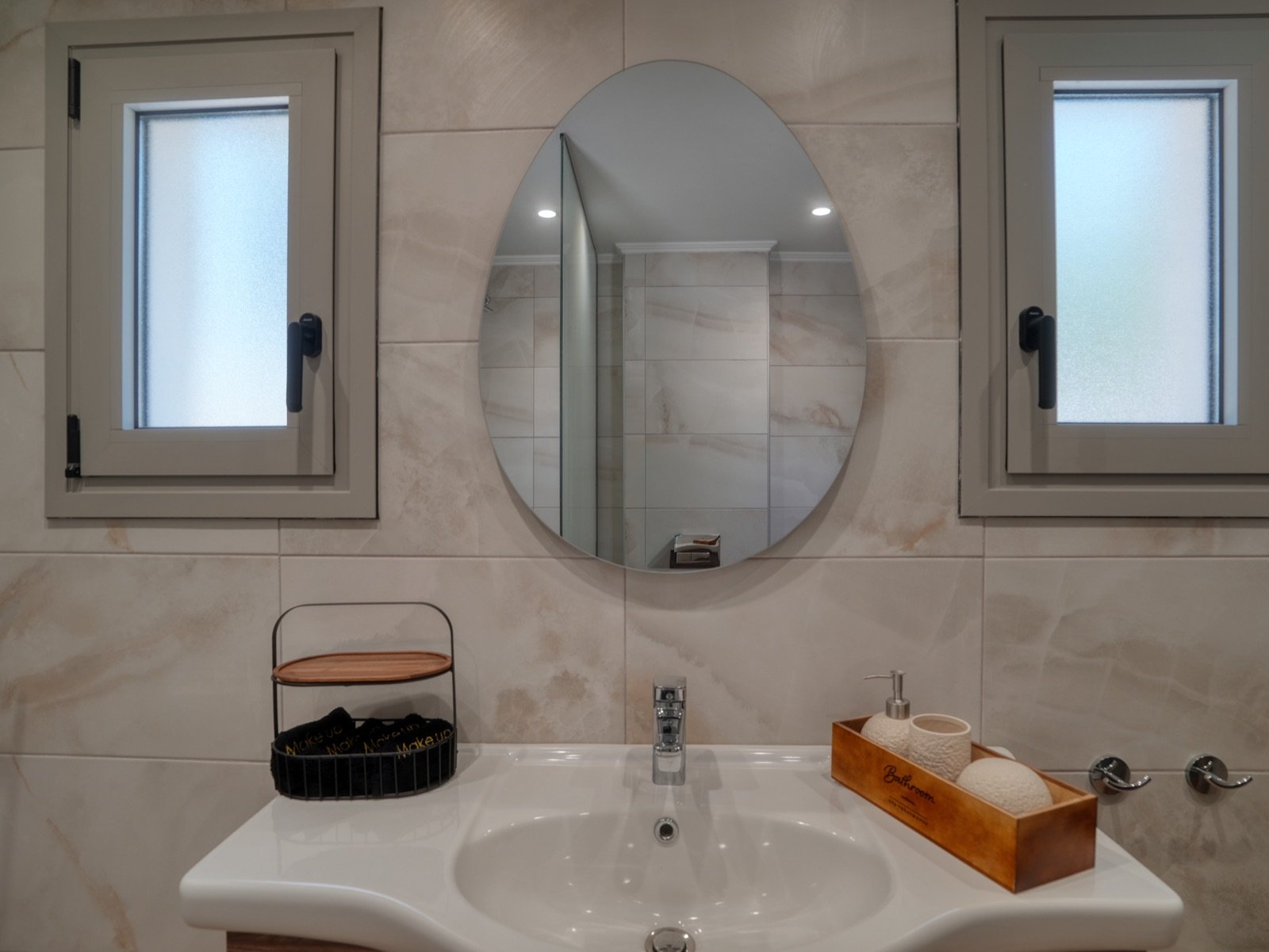 Bathroom vanity with round mirror